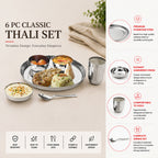 6-piece classic thali set with food on a beige surface, featuring premium stainless steel and elegant design.